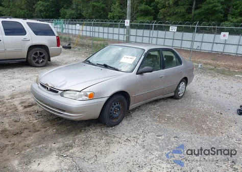 1999 Toyota Corolla Le z USA, uszkodzony, nr VIN 1NXBR12E3XZ238937